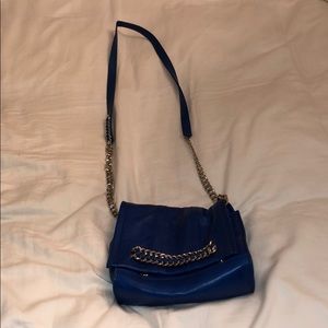 Blue chain cross body bag